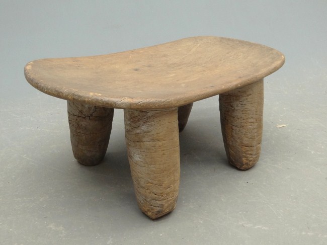 African carved stool. 27 1/2'' W