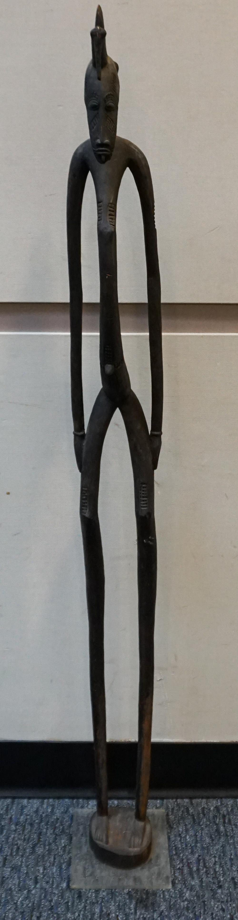 AFRICAN CARVED WOOD ELONGATED