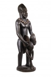 AFRICAN CARVED WOOD FIGURE Sta
