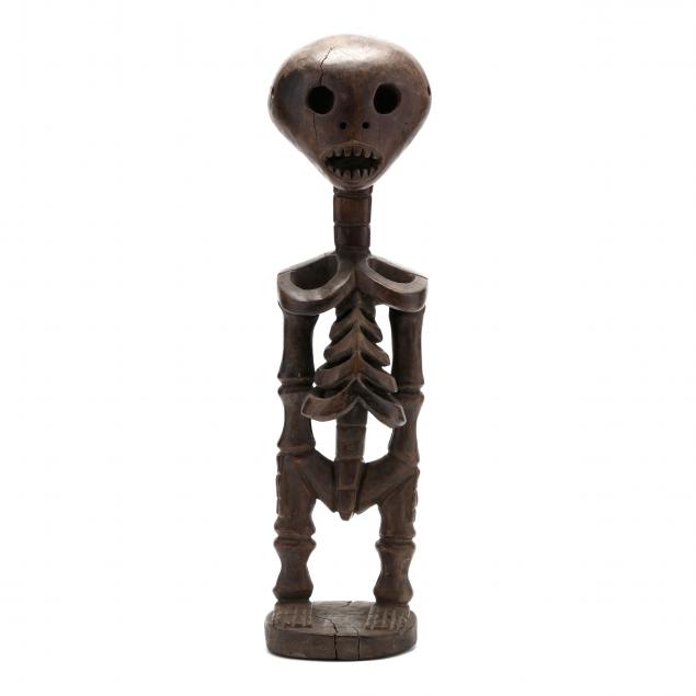 AFRICAN CARVED WOODEN SKELETON An