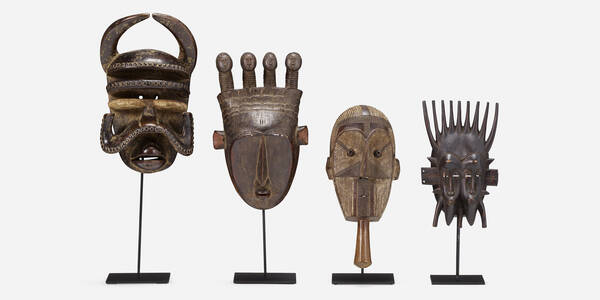 African. Four masks. carved wood,