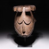 African mask carved from a sin