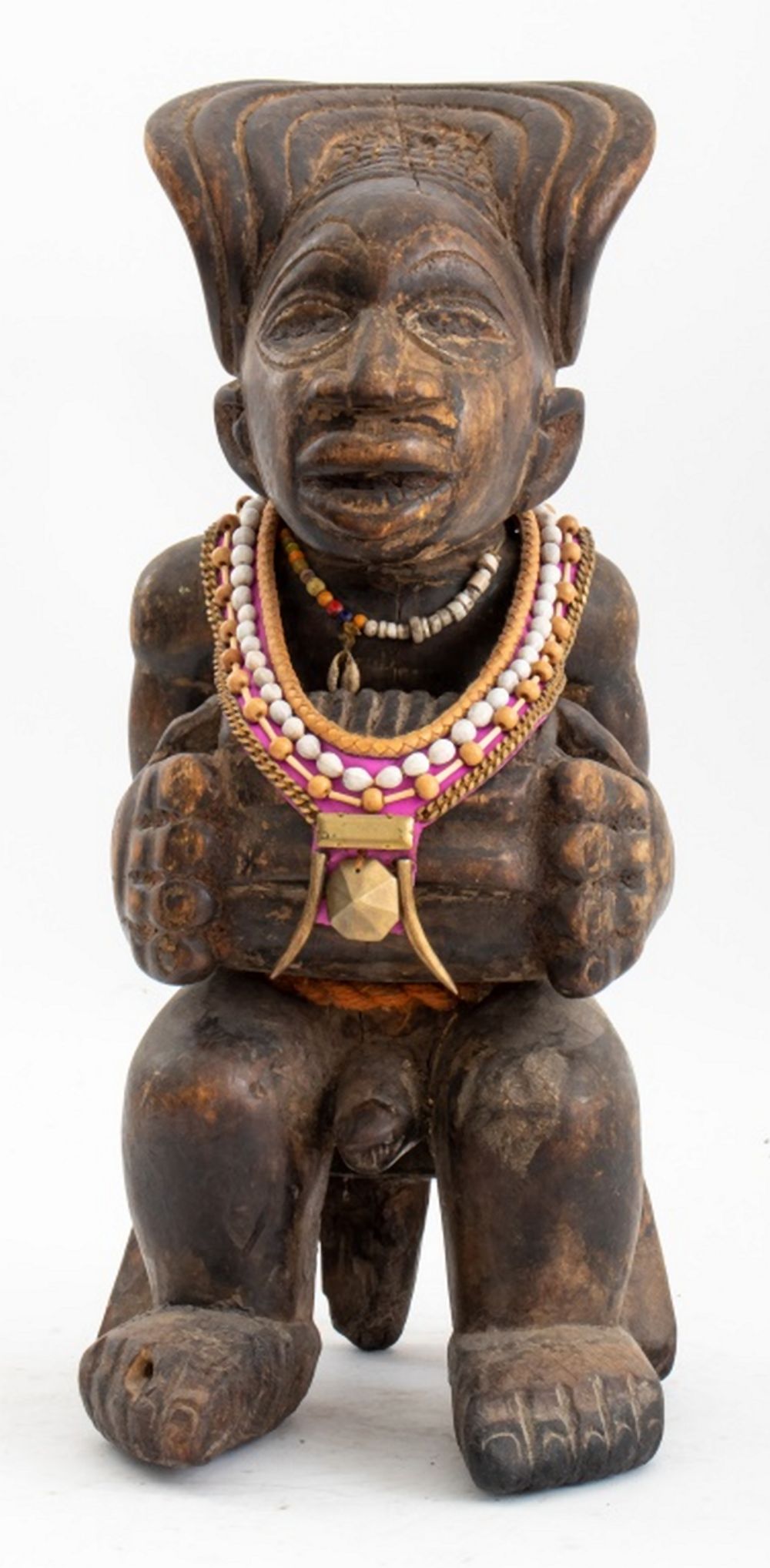 AFRICAN SEATED CHIEF PLAYING SANZA,