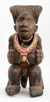 AFRICAN SEATED CHIEF PLAYING S
