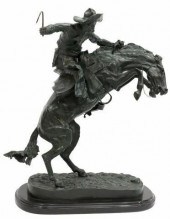 AFTER REMINGTON BRONCO BUSTER