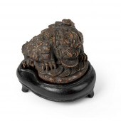 AGARWOOD CARVING OF A THREE-LE