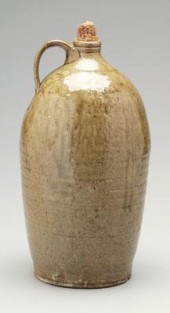 Alkaline glaze jug, strap hand