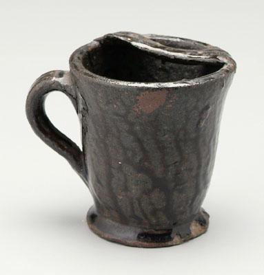 Alkaline glaze mustache cup,