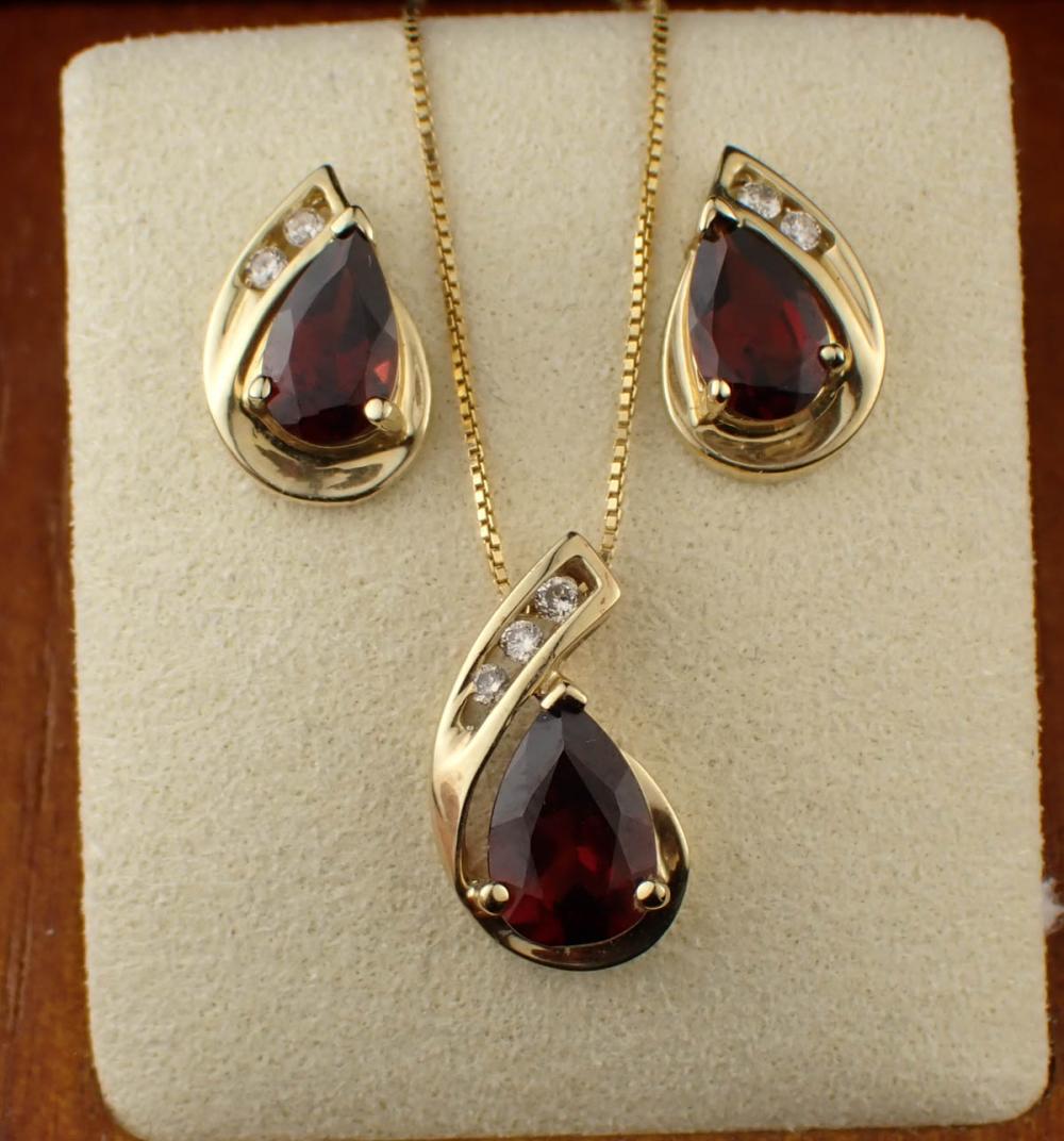 ALWAND VAHAN GARNET AND YELLOW GOLD