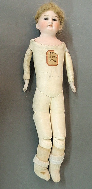 Am bisque head doll with kid