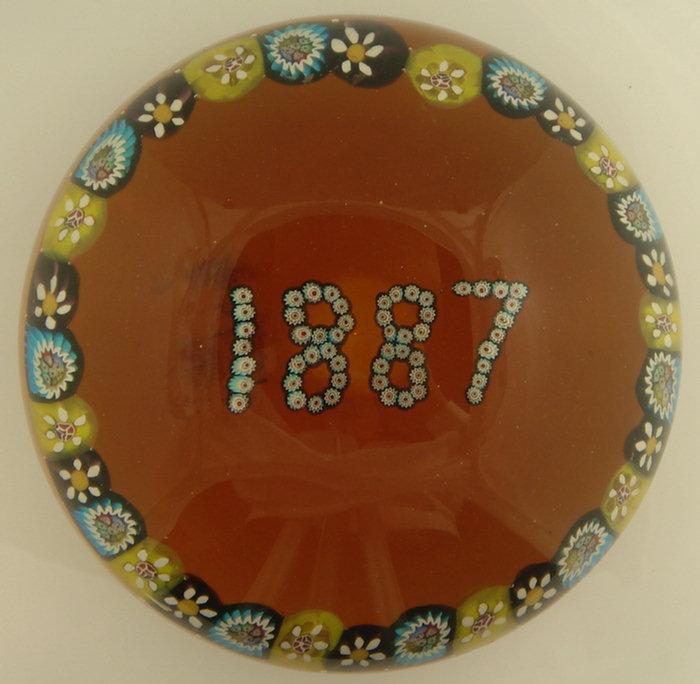 Amber blown glass paperweight