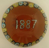 Amber blown glass paperweight