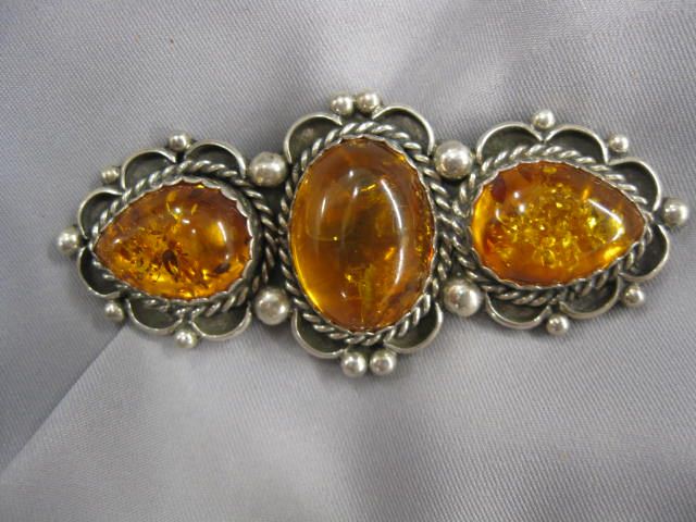 Amber Brooch trio of golden