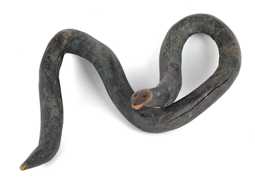 American carved and painted root