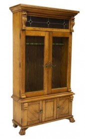 AMERICAN CARVED OAK GUN CABINE