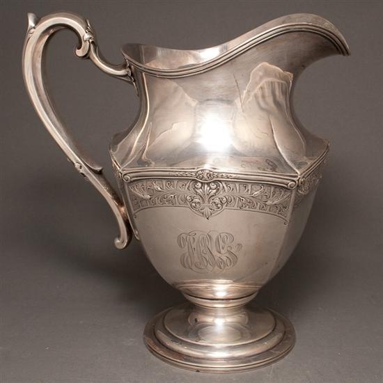American chased silver water