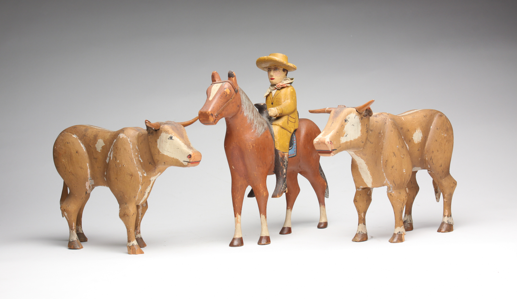 AMERICAN FOLK ART COWBOY AND TWO