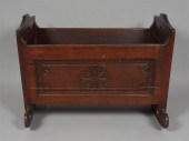 AMERICAN MAHOGANY ROCKING CRAD