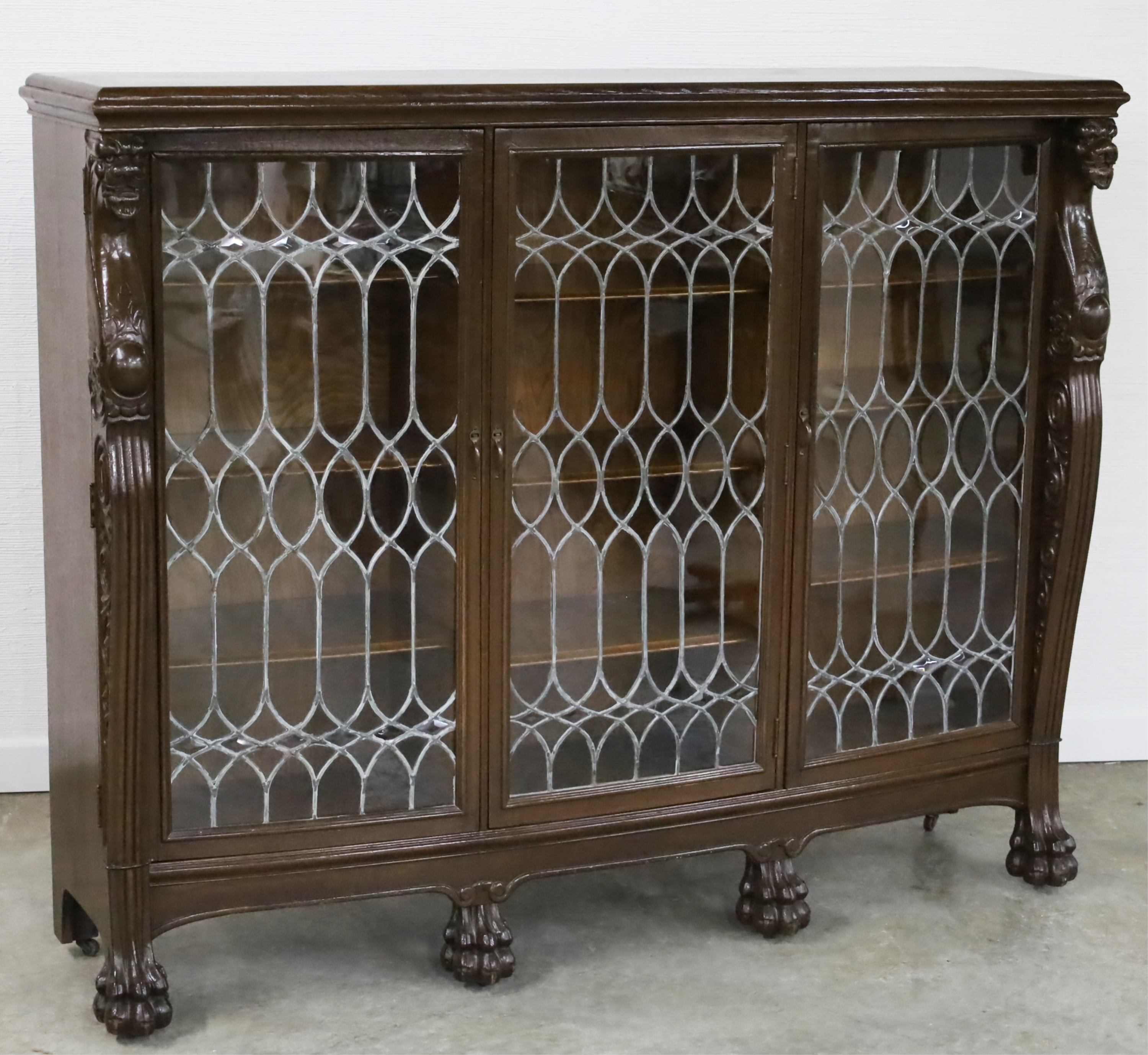 AMERICAN OAK BOW FRONT BOOKCASE