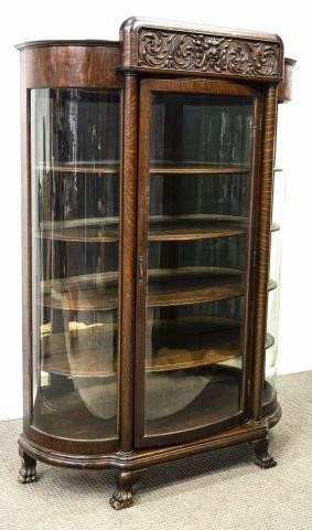 AMERICAN OAK BOWFRONT GLAZED