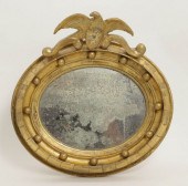 AMERICAN PETITE GILT OVAL MIRR