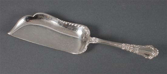 American sterling silver crumber in