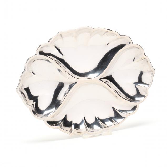 AMERICAN STERLING SILVER DIVIDED