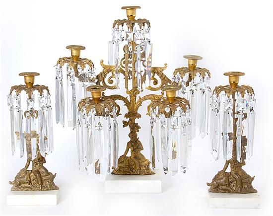 American three-piece gilt-brass
