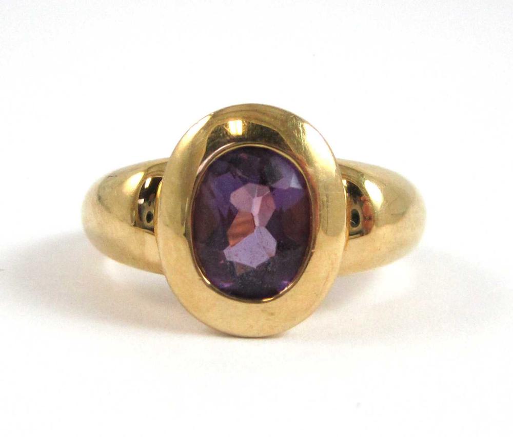 AMETHYST AND EIGHTEEN KARAT GOLD