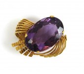 AMETHYST AND EIGHTEEN KARAT GO