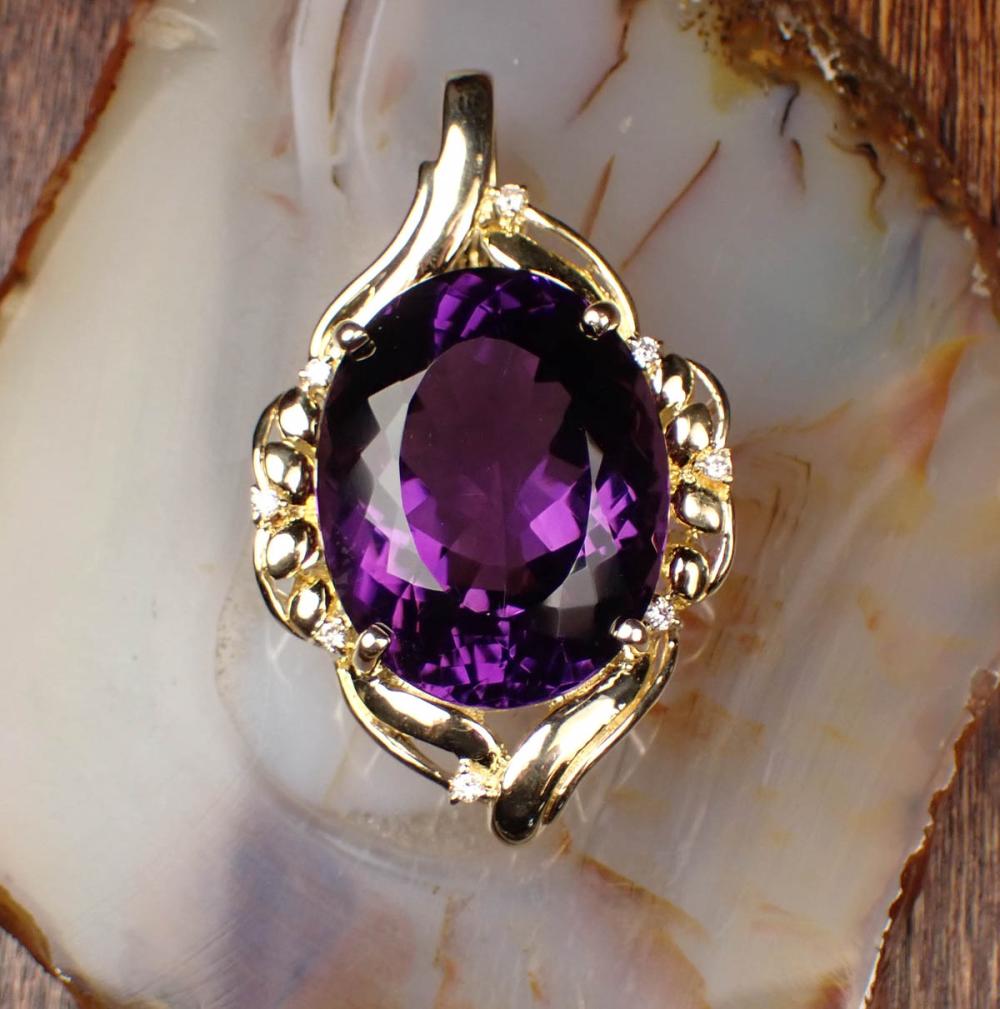 AMETHYST AND FOURTEEN KARAT GOLD