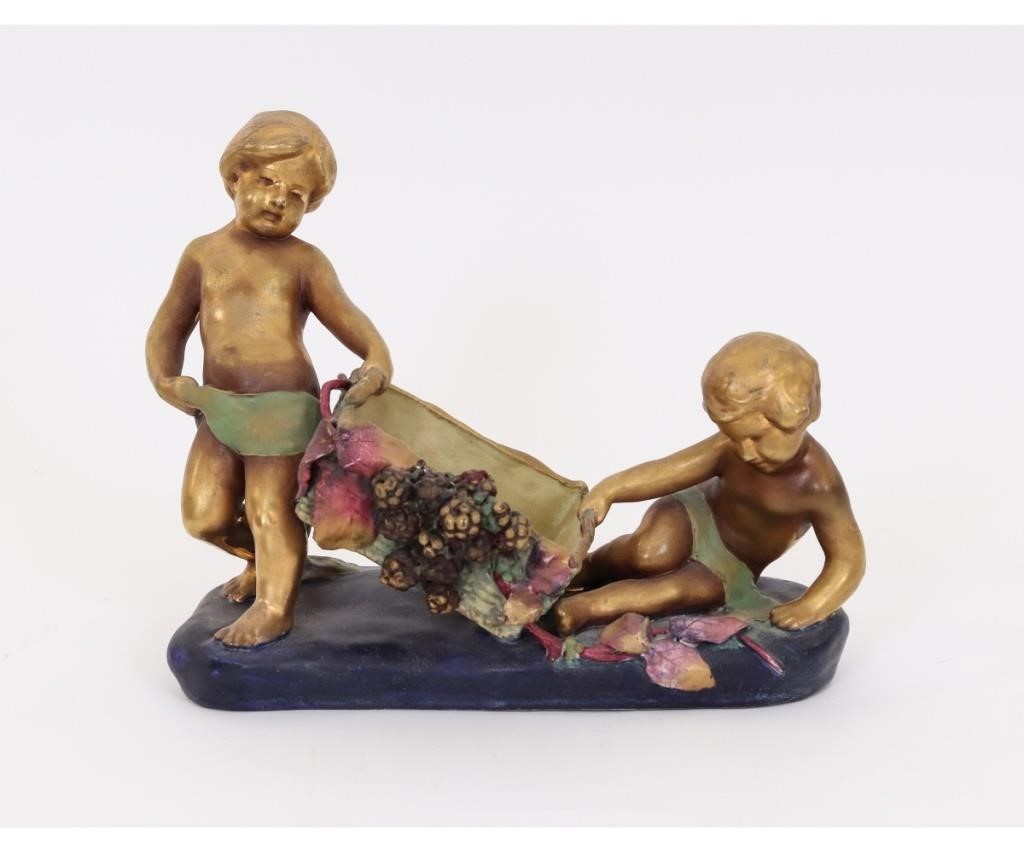 Amphora planter with two children