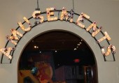 “AMUSEMENTS" HANGING SIGN FROM