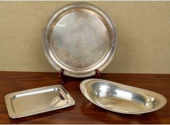 An 11"L oval bread tray signed
