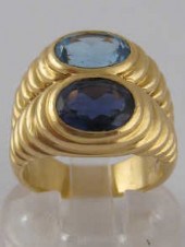 An 18 carat gold blue topaz an