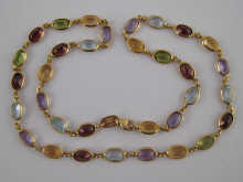 An 18 carat gold multi gem