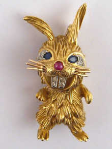 An 18 carat gold rabbit brooch by