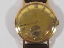 An 18 ct gold gent's wrist watch c.