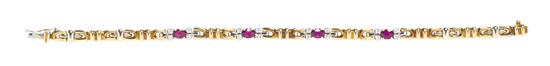 * An 18 Karat Gold Ruby and Diamond
