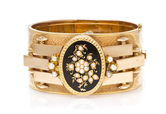 *An 18 Karat Rose Gold Enamel and