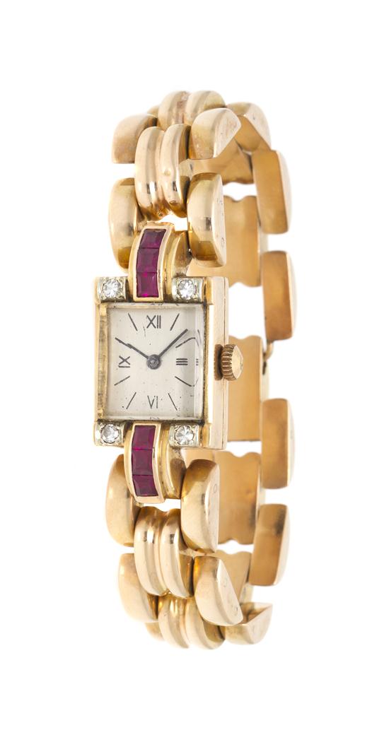 An 18 Karat Rose Gold Synthetic