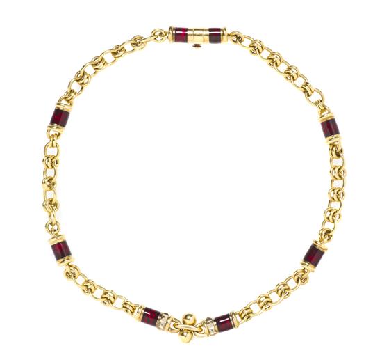 * An 18 Karat Yellow Gold and