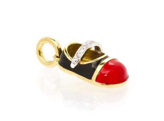* An 18 Karat Yellow Gold