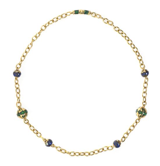 * An 18 Karat Yellow Gold and