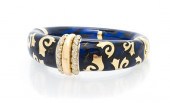 * An 18 Karat Yellow Gold Poly