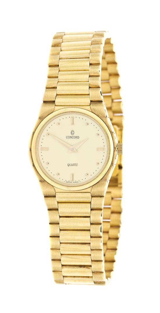 * An 18 Karat Yellow Gold Quartz