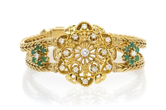 * An 18 Karat Yellow Gold Diamond