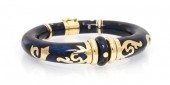 An 18 Karat Yellow Gold Sterli