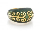 An 18 Karat Yellow Gold and En