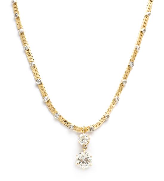 An 18 Karat Yellow Gold and Diamond